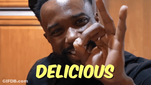 Man Making Peace Sign With Word Delicious GIF