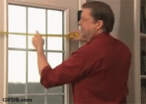 Man Measuring Window With Tape GIF
