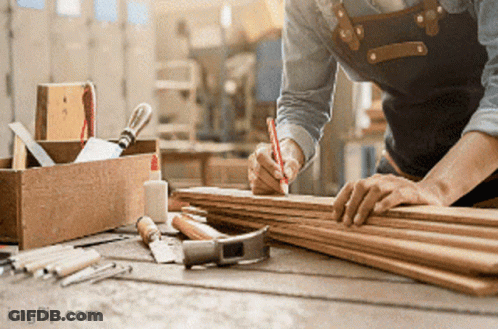 Man Measuring Wood With Red Pen GIF