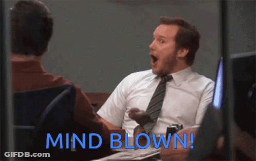 Man Mind Blown At Desk GIF