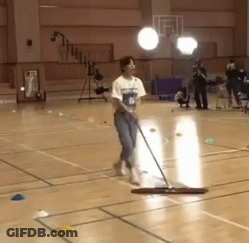 Man Mopping Basketball Court Floor GIF