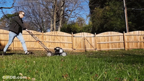 Man Mowing Lawn GIF