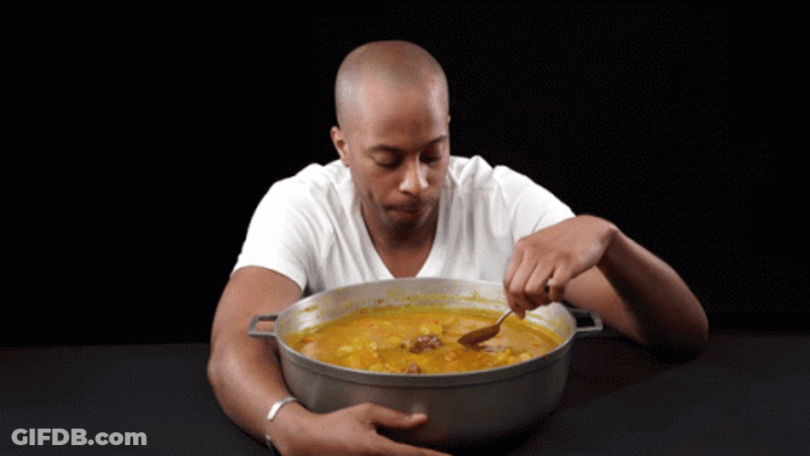 Man Munching On Pot Of Curry GIF