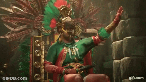 Man Native American Costume On Throne Holding Sword GIF