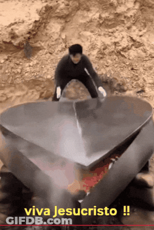 Man Next To Large Metal Heart Viva Jesucristo GIF