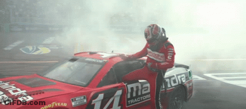 Man Next To Red Race Car Number 14 GIF