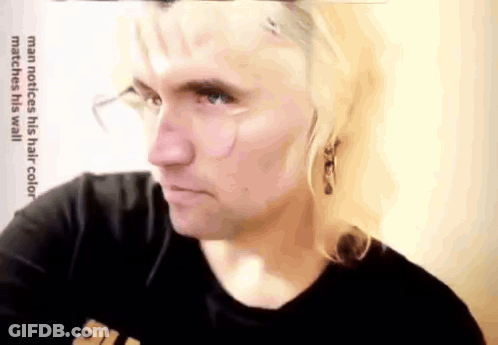 Man Notices His Hair Color Matched His Wall GIF