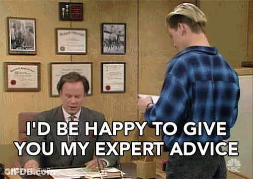 Man Offering Expert Advice At Desk GIF