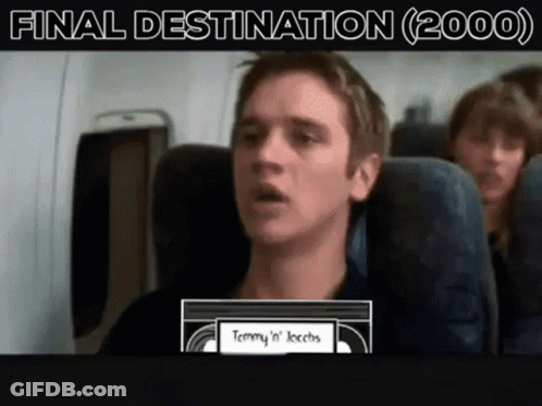 Man On Airplane Holding Tommy 'N' Jacobs VHS Tape GIF