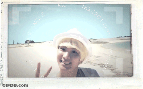 Man On Beach With Number 420 GIF