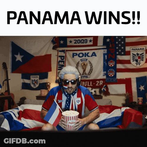 Man On Bed Holding Popcorn And Panama Wins Sign GIF