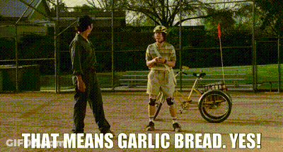 Man On Bicycle Talking To Man On Baseball Field GIF