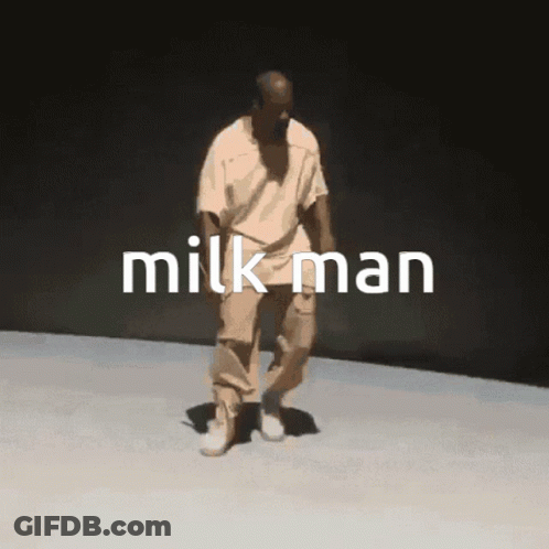 Man On Black Background With Milk Man Text GIF