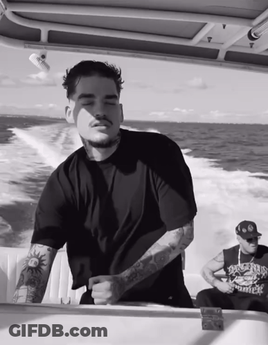 Man On Boat In Dirty Bastard Shirt GIF