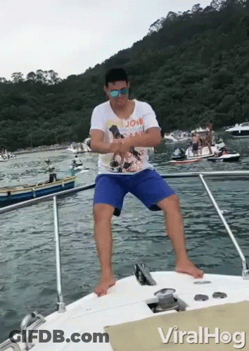 Man On Boat With John Shirt GIF