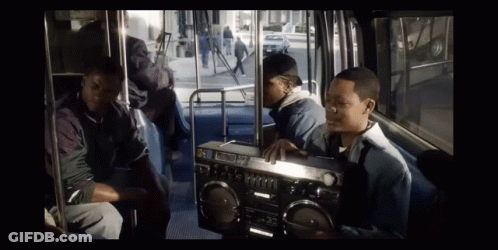 Man On Bus Holding Panasonic Boombox GIF