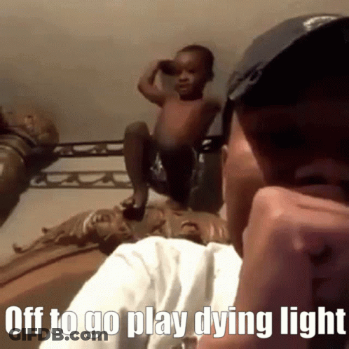 Man On Cell Phone With Baby Saying Off To Go Play Dying Light GIF