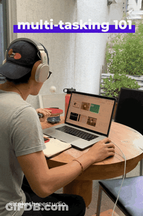 Man On Computer Multitasking GIF