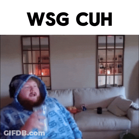 Man On Couch Holding Glass Saying WSG CUH GIF
