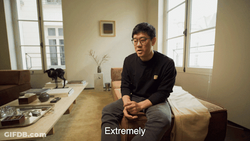 Man On Couch In Living Room Saying Extremely GIF