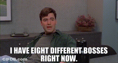 Man On Couch Saying I Have Eight Different Bosses GIF