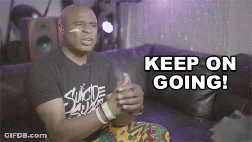 Man On Couch Saying Keep On Going GIF