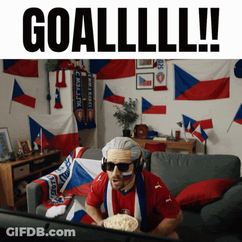Man On Couch Watching Game Saying Goallll GIF