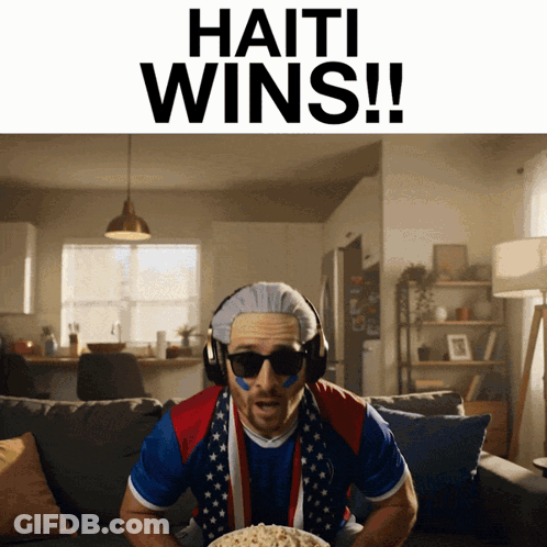 Man On Couch With Bowl Of Popcorn Haiti Wins GIF