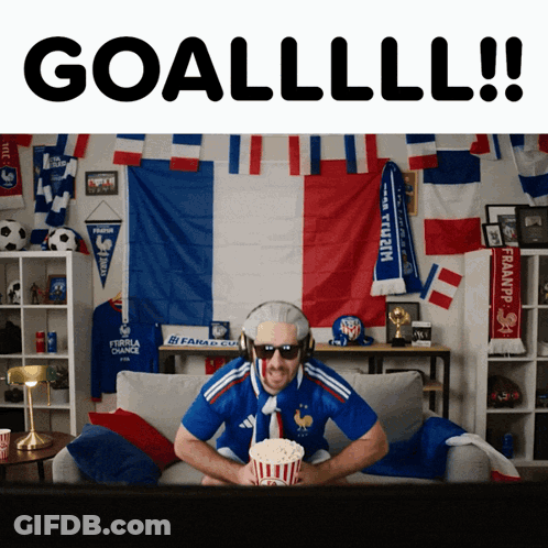 Man On Couch With Popcorn And Goal GIF