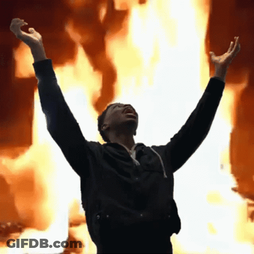 Man On Fire Arms Up Fiery Background GIF