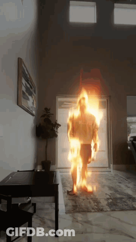 Man On Fire Wearing Hulk Shirt GIF