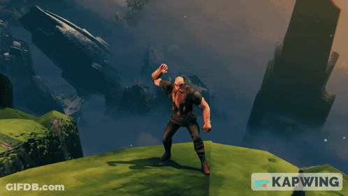 Man On Grassy Hill Next To Kapwing Sign GIF