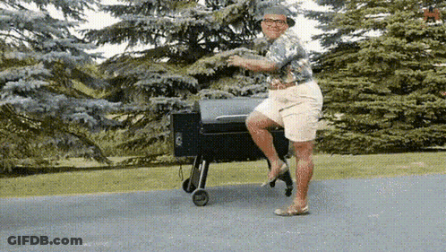 Man On Grill Legs Crossed GIF