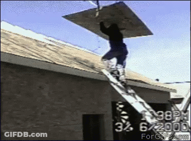 Man On Ladder Carrying Wood On Roof GIF