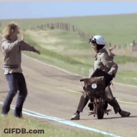 Man On Motorcycle Pushed By Another Person GIF
