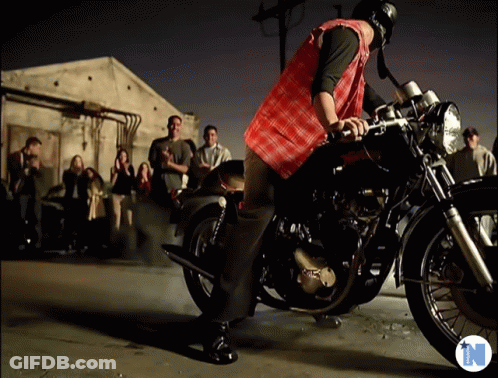 Man On Motorcycle With Letter N GIF