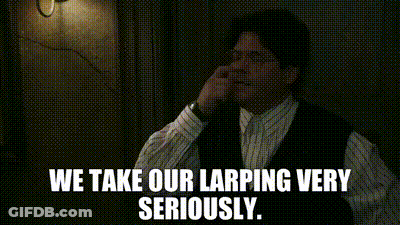 Man On Phone We Take Our Larping Very Seriously GIF