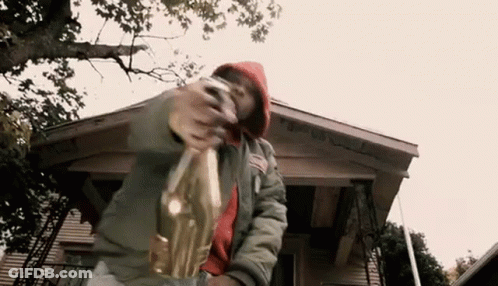 Man On Porch Holding Champagne GIF