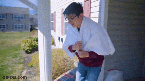 Man On Porch With White Towel GIF