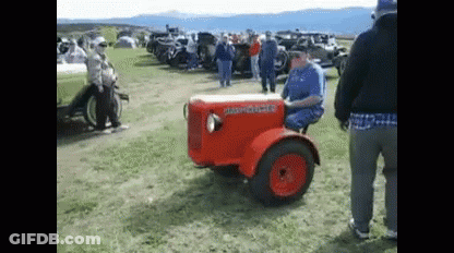 Man On Red Massey Ferguson Tractor GIF