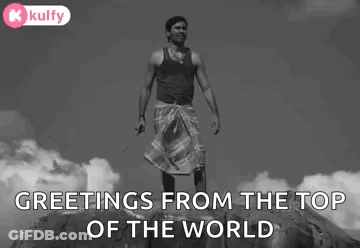 Man On Rock Greetings From Top Of World GIF