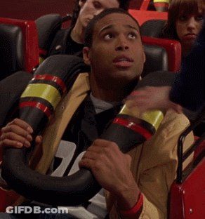 Man On Roller Coaster Holding Steering Wheel Number 27 GIF