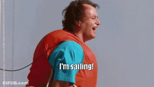 Man On Sailboat Saying I'm Sailing GIF