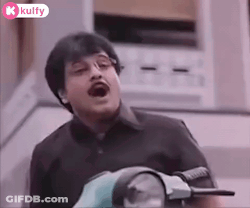 Man On Scooter Making Funny Face GIF