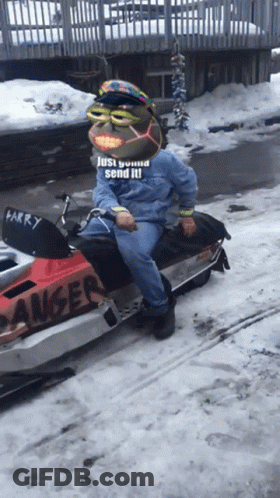 Man On Snowmobile With Larry GIF