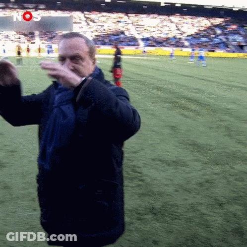 Man On Soccer Field Before Nos Sign GIF
