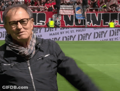 Man On Soccer Field In Front Of Made By FC St. Pauli Banner GIF