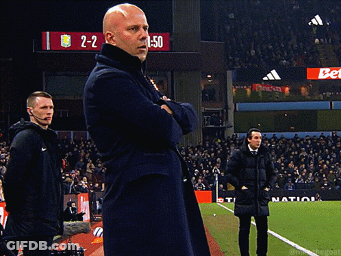 Man On Soccer Field In Front Of Scoreboard 2-2 GIF