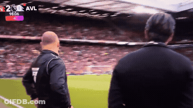 Man On Soccer Field In Front Of Scoreboard Saying SL5 GIF