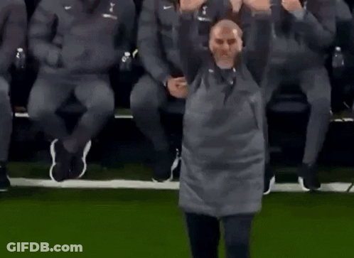 Man On Soccer Field With Hands Outstretched GIF